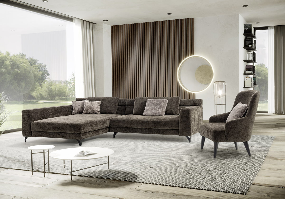 Hackl Lebensräume Wohnzimmer mit Couch und Sessel